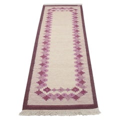 Swedish textile designer. Handwoven runner in pure wool. Rölakan technique.