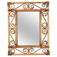Espejo rectangular de ratán estilo Franco Albini con motivos de volutas