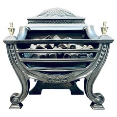 Grille de foyer en fonte de style 19e siècle.