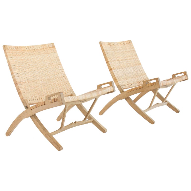 Pair of Hans Wegner Oak and Cane Folding Lounge Chairs 