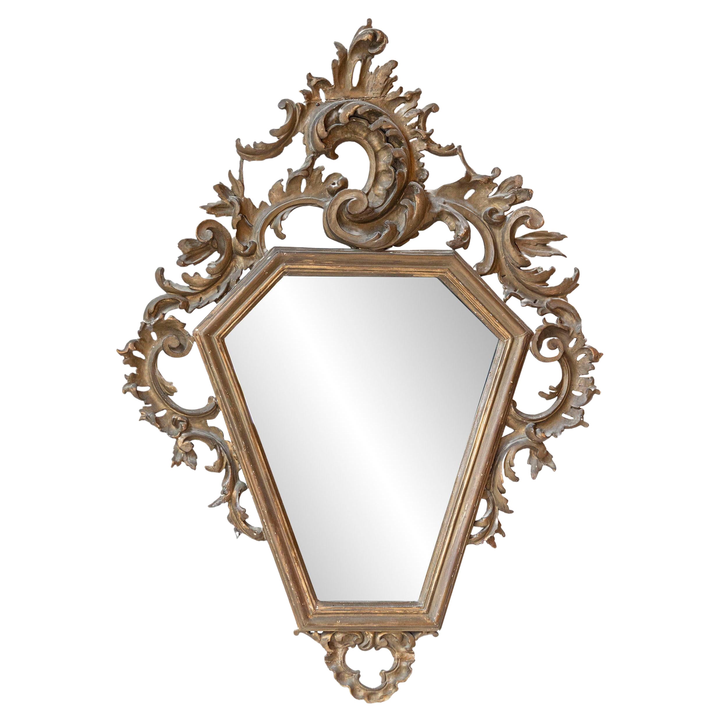 Italian 19th Century Rococo Style Carved Mirror with Traces of Gilt and Scrolls For Sale