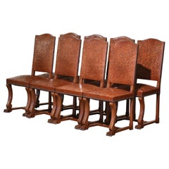 Early 20th Century Spanish Baroque Carved Walnut Chairs with Leather, Set of 8