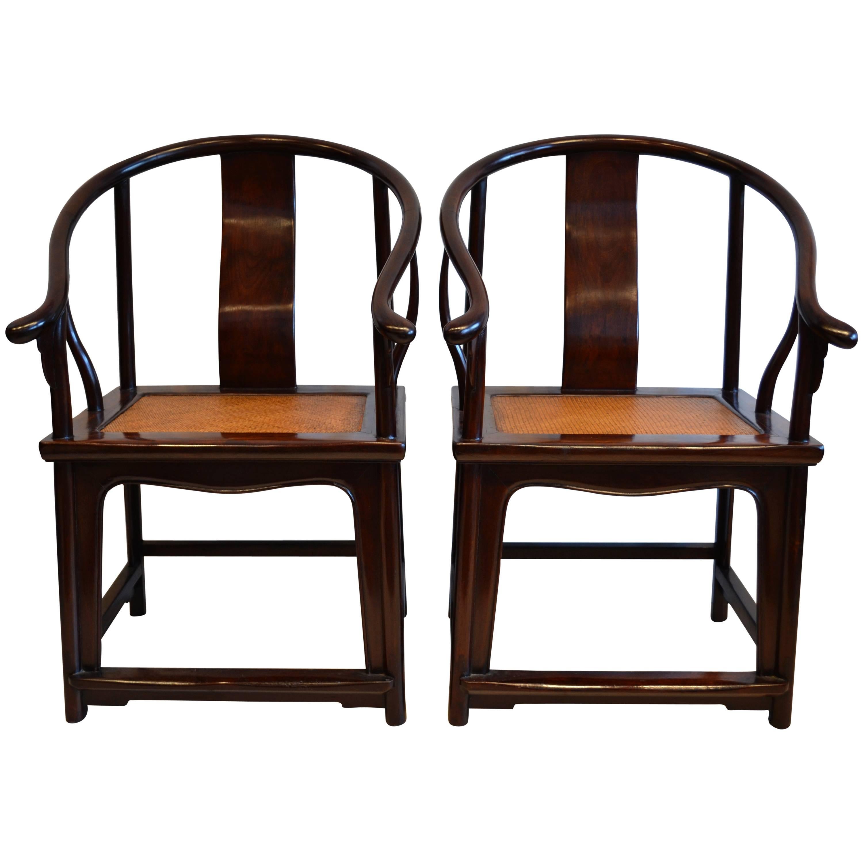 Pair of Early Chinese Horseshoe Back Arm Chairs