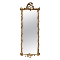 Grand et étroit miroir mural italien sculpté en bois doré rococo du XVIIIe siècle