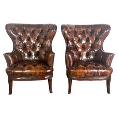 Pair of 19th Century English Leather Tufted Armchairs
