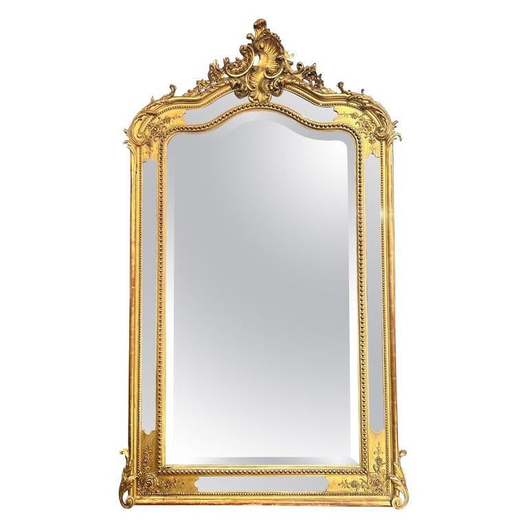 Antique French Louis XV Carved Wood and Gold Leaf Mirror, circa 1890.