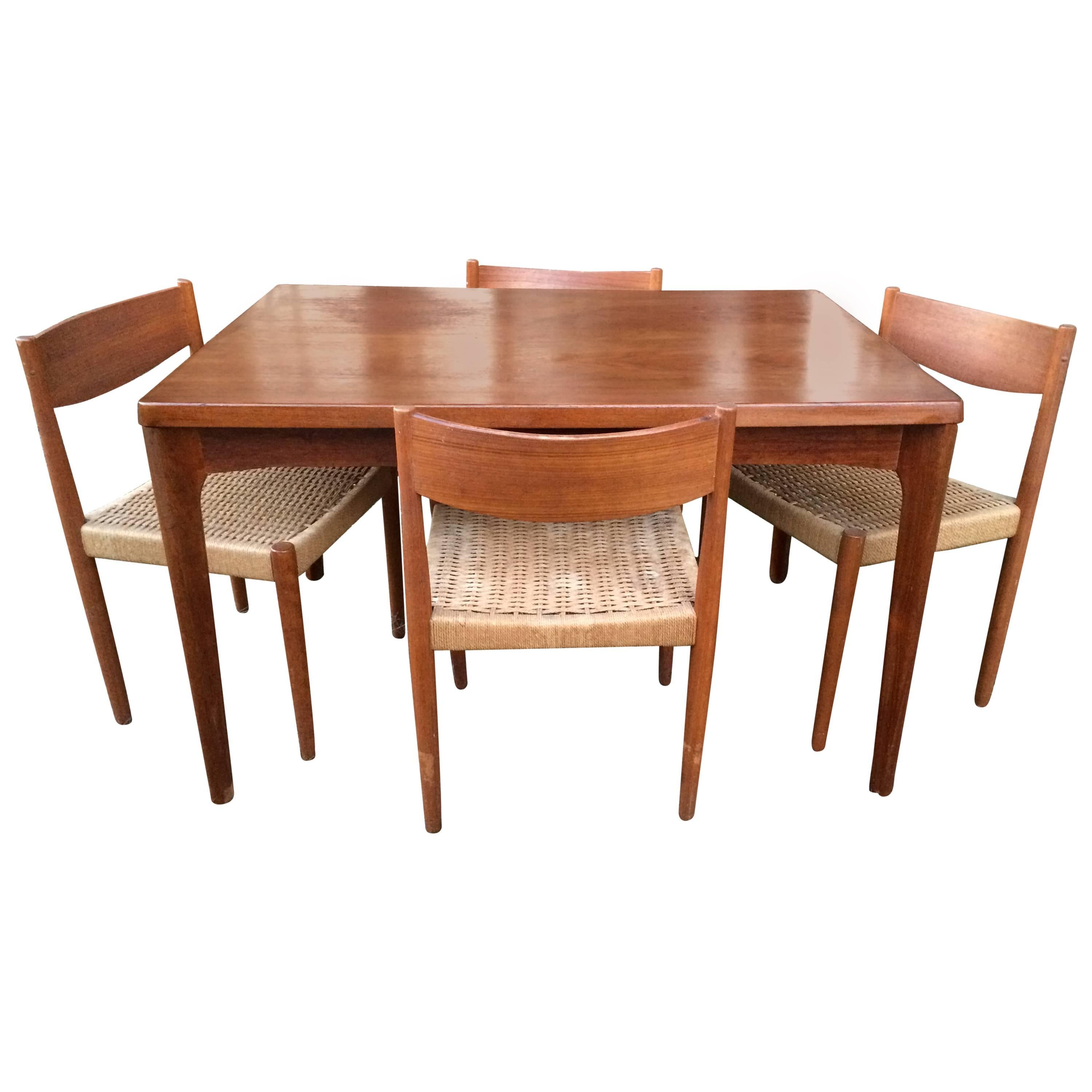 Danish Modern Extendable Teak Dining Table with Woven Chairs