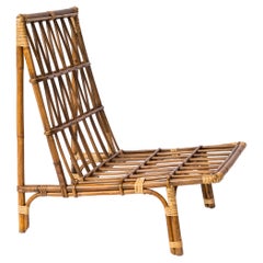 Fauteuil de salon mi-siècle en rotin dans le style d'Audoux Minnet, France, années 1960