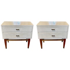 Pair of Mid Century Modern white parchment night stands.