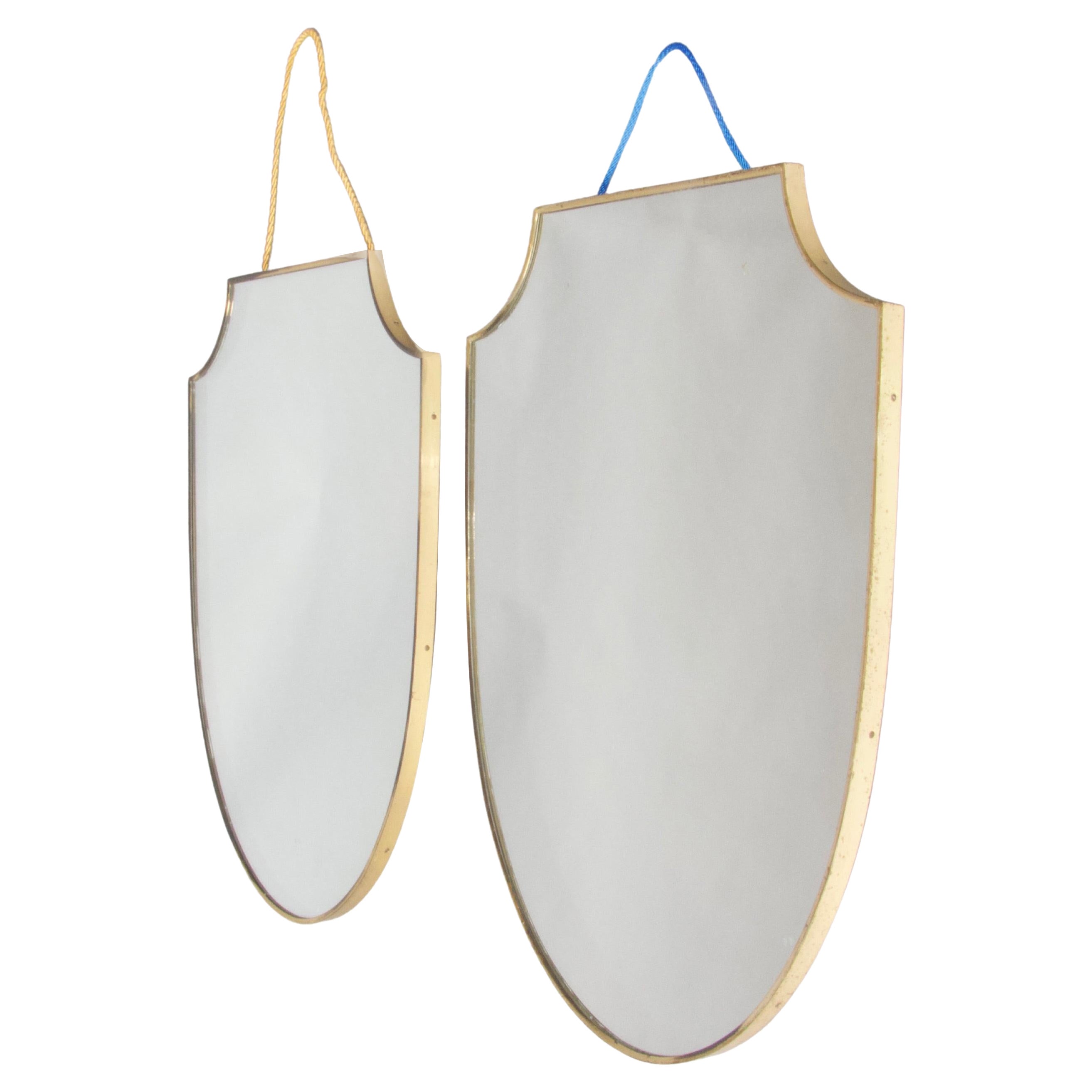 Paire de miroirs muraux ecusson