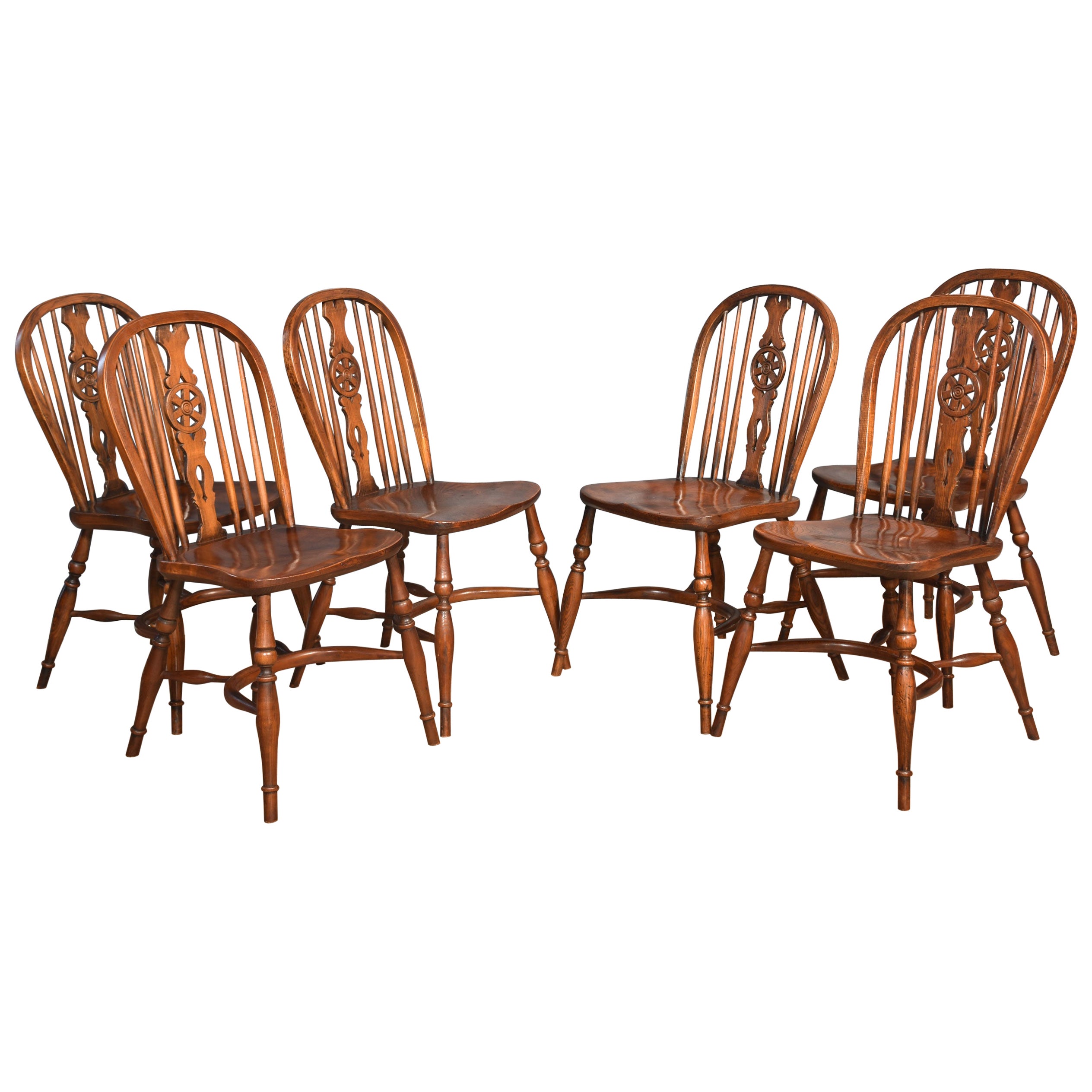 Set of six elm spindle back dining chairs