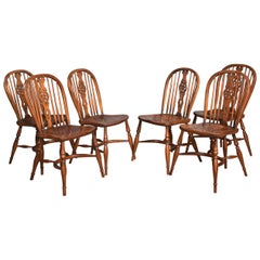 Set of six elm spindle back dining chairs