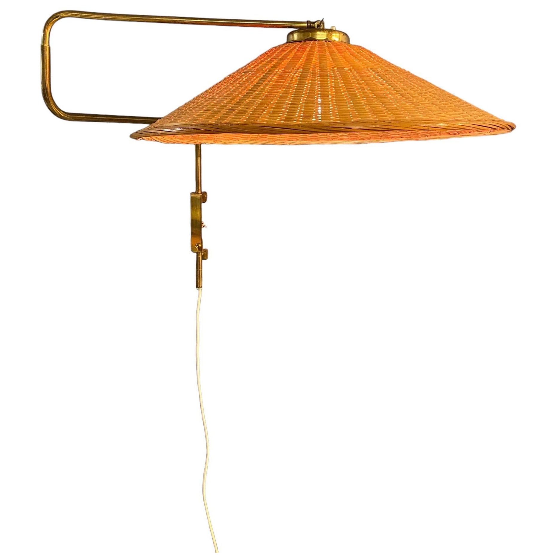 Vintage Finnish Design Adjustable Wall Lamp in Brass & Wicker, Valinte 1950s