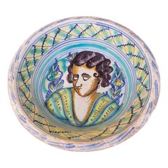 Assiette en céramique espagnole Triana "Lebrillo" du 19ème siècle avec visage de femme peint