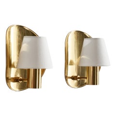 Designer norvegese, lampade da parete, ottone, tessuto, Norvegia, anni '60