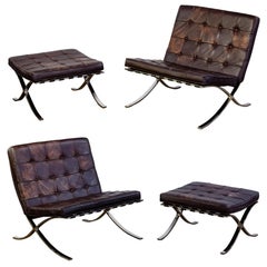 Four Barcelona Chrome and Leather Chairs and Ottomans by Mies van der Rohe