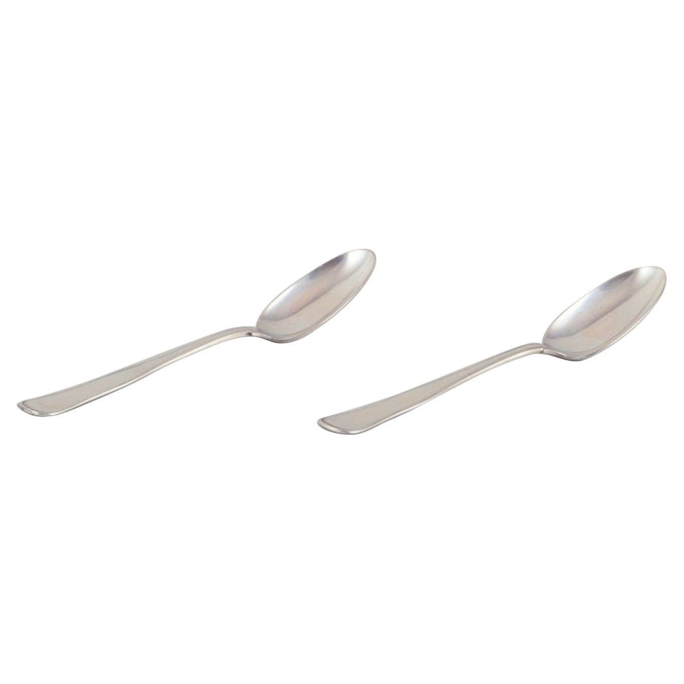 Swedish silversmith, two "Old Danish" pattern dessert spoons/children's spoons.
