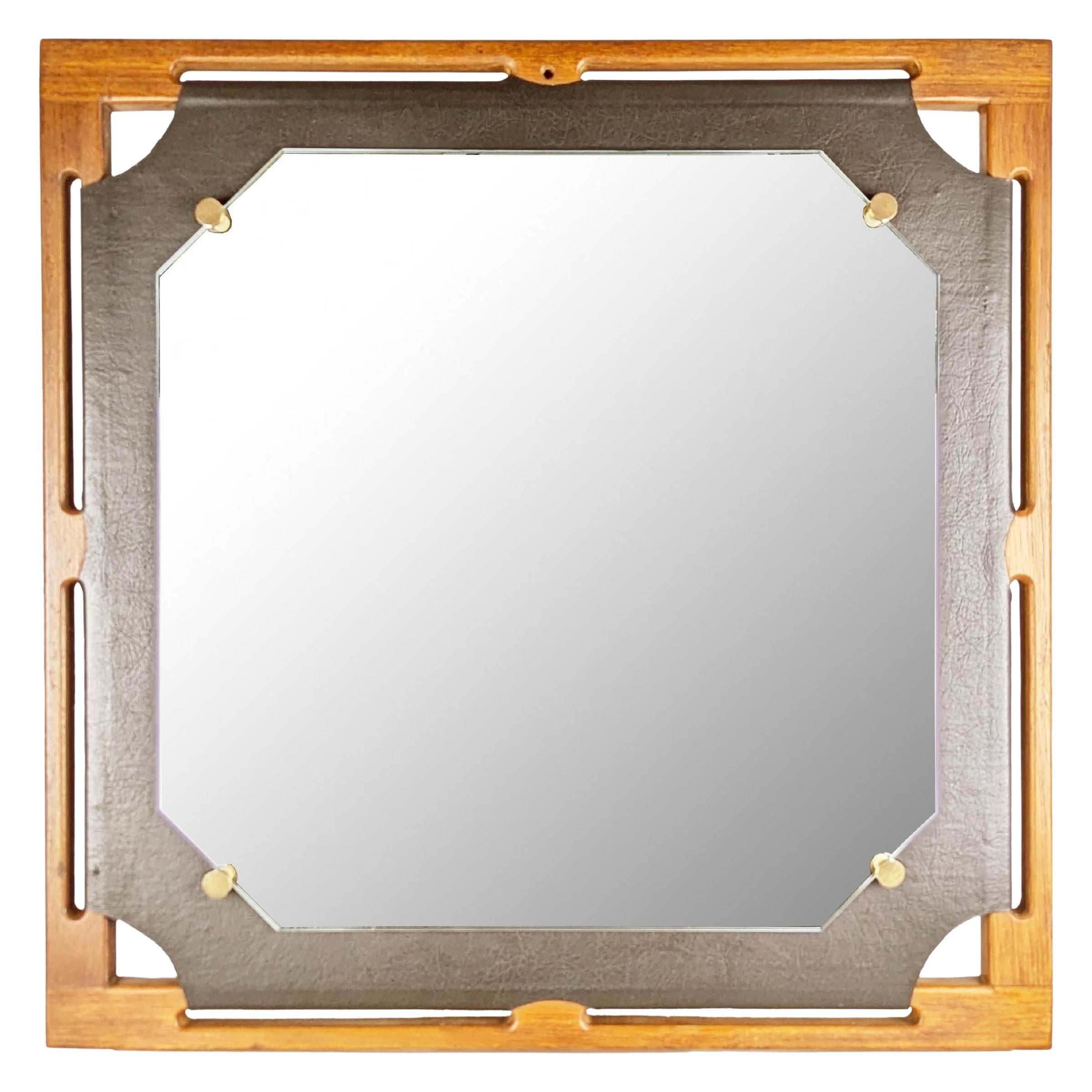 Italian teakwood & black skai 1960s wall mirror For Sale