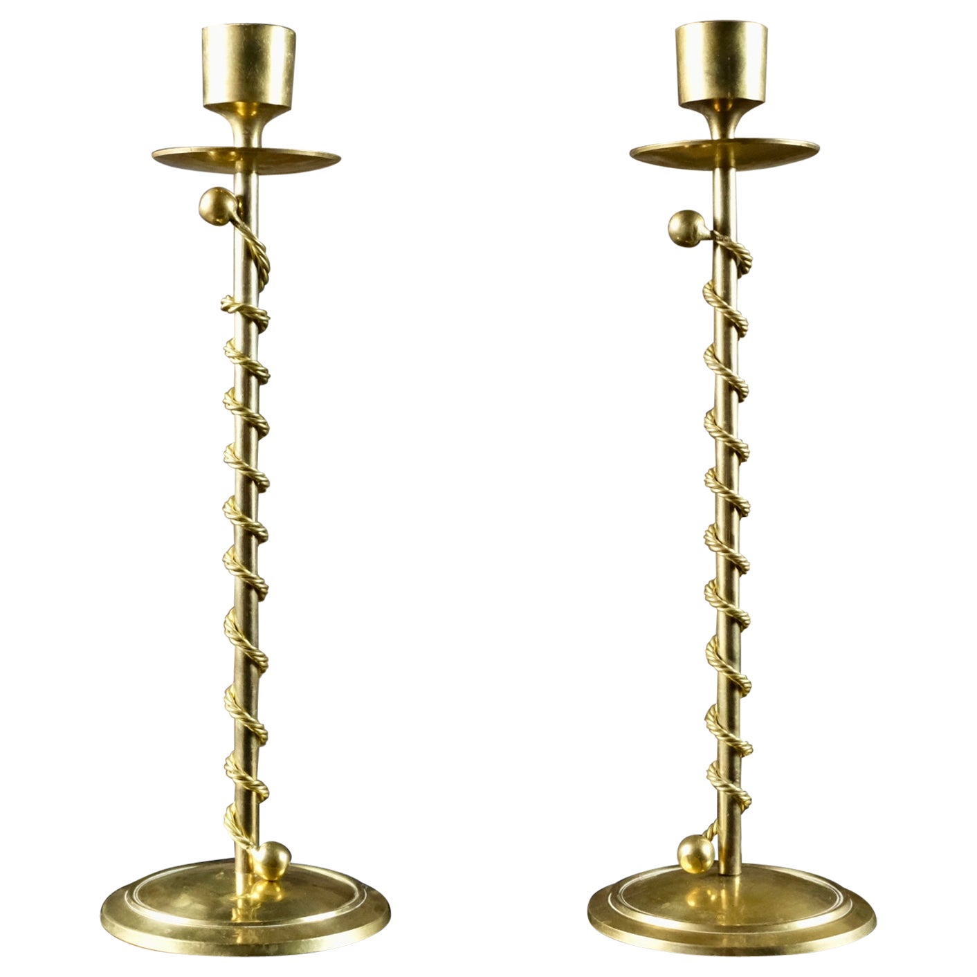 Pair of twisted Art Deco brass candlesticks, France, 1930s