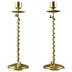 Pair of twisted Art Deco brass candlesticks, France, 1930s