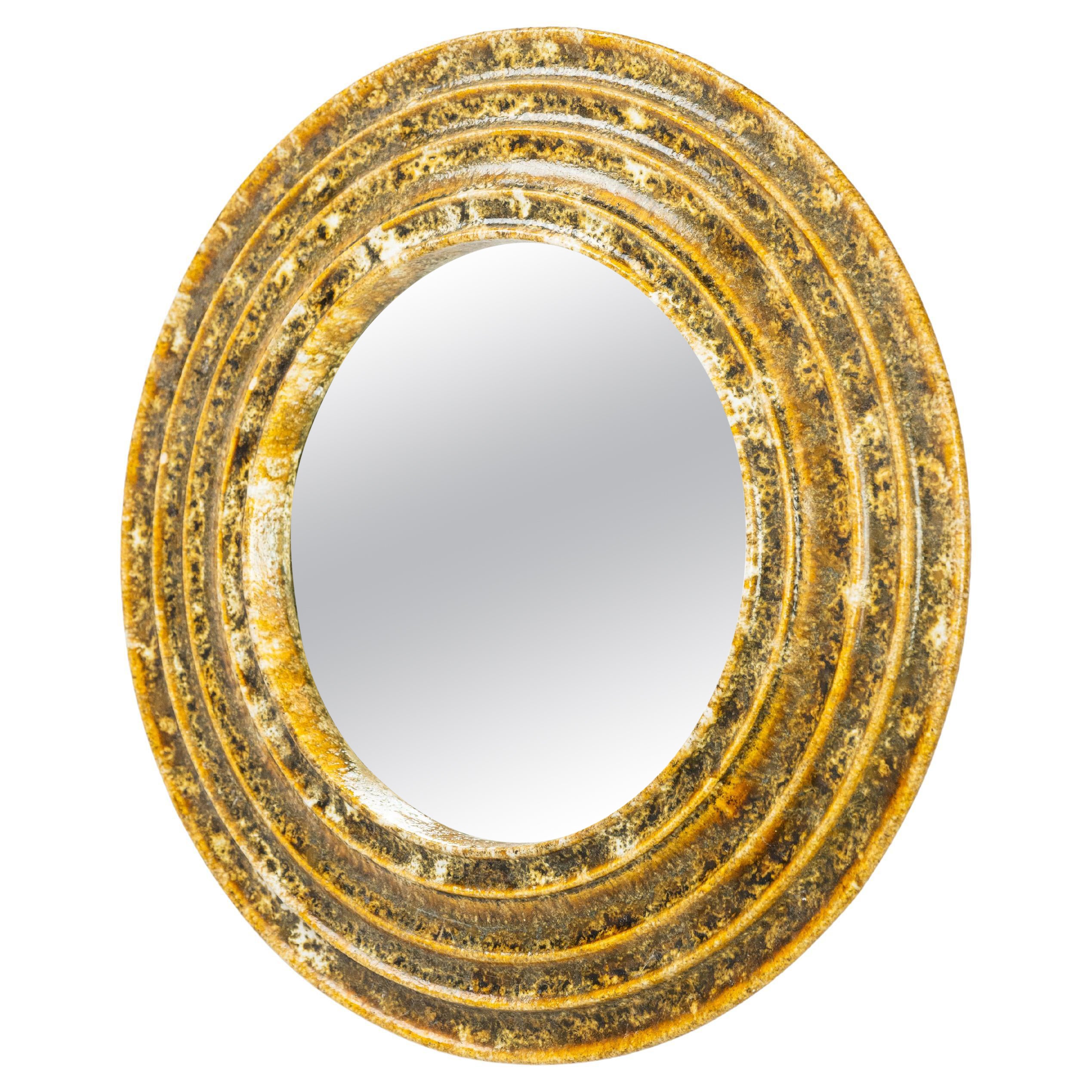Gold ceramic round mirror
