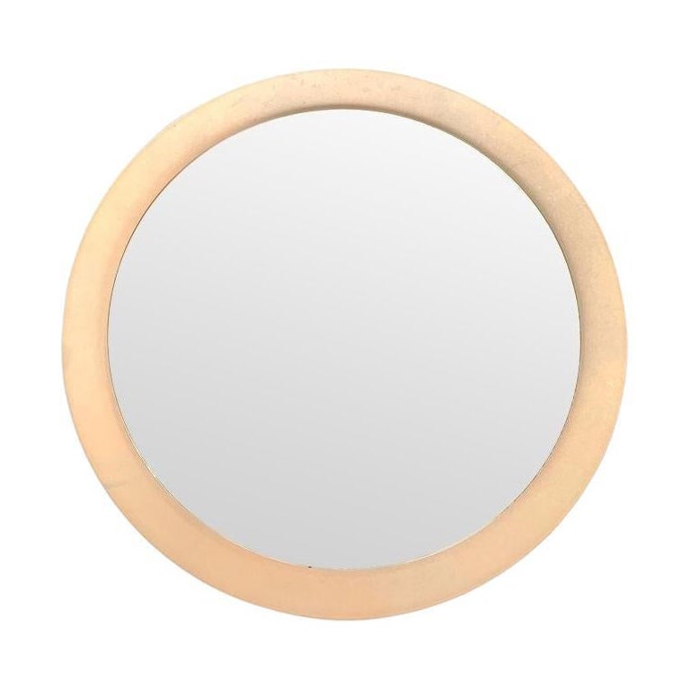 A large dusty pink concave framed circular mirror in the Style of Max Ingrand For Sale