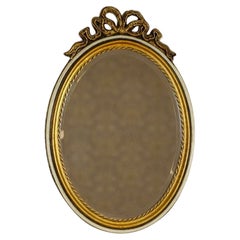 Oval Louis-Style Mirror From the Middle 20th Century in Colored Gold Frame