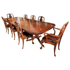 Antique A fine late 19th c Queen Anne style burled Walnut dining table and 8 chairs