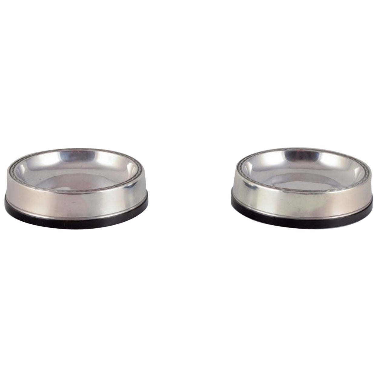 GAB, Sweden. Two salt cellars in 830 silver and bakelite. Art Deco style.
