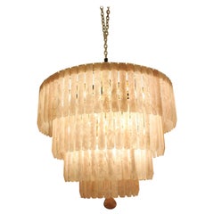 A beautiful rose quartz 4 tiered rock crystal chandelier