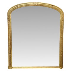 A Stunning 19th Century Elegantly Simple Archtop Giltwood Overmantel Mirror