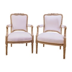 A fine pair of 19th century French Louis XVI grey painted large armchairs