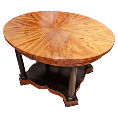 A fine 19th century Austrian Biedermeier walnut and ebonized centertable