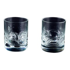 Holmegaard, dos vasos de whisky en vidrio artístico transparente.