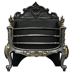 A Brass and Polished Steel French Firegrate
