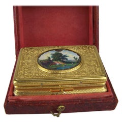 Scatola per uccelli canterini di Bruguier con custodia in argento dorato e smalto.  Coperchio
