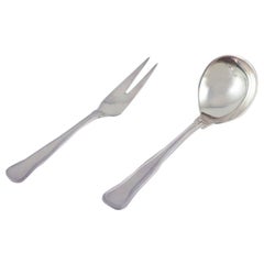 Cohr, Old Danish". Large serving spoon and carving fork in silver.