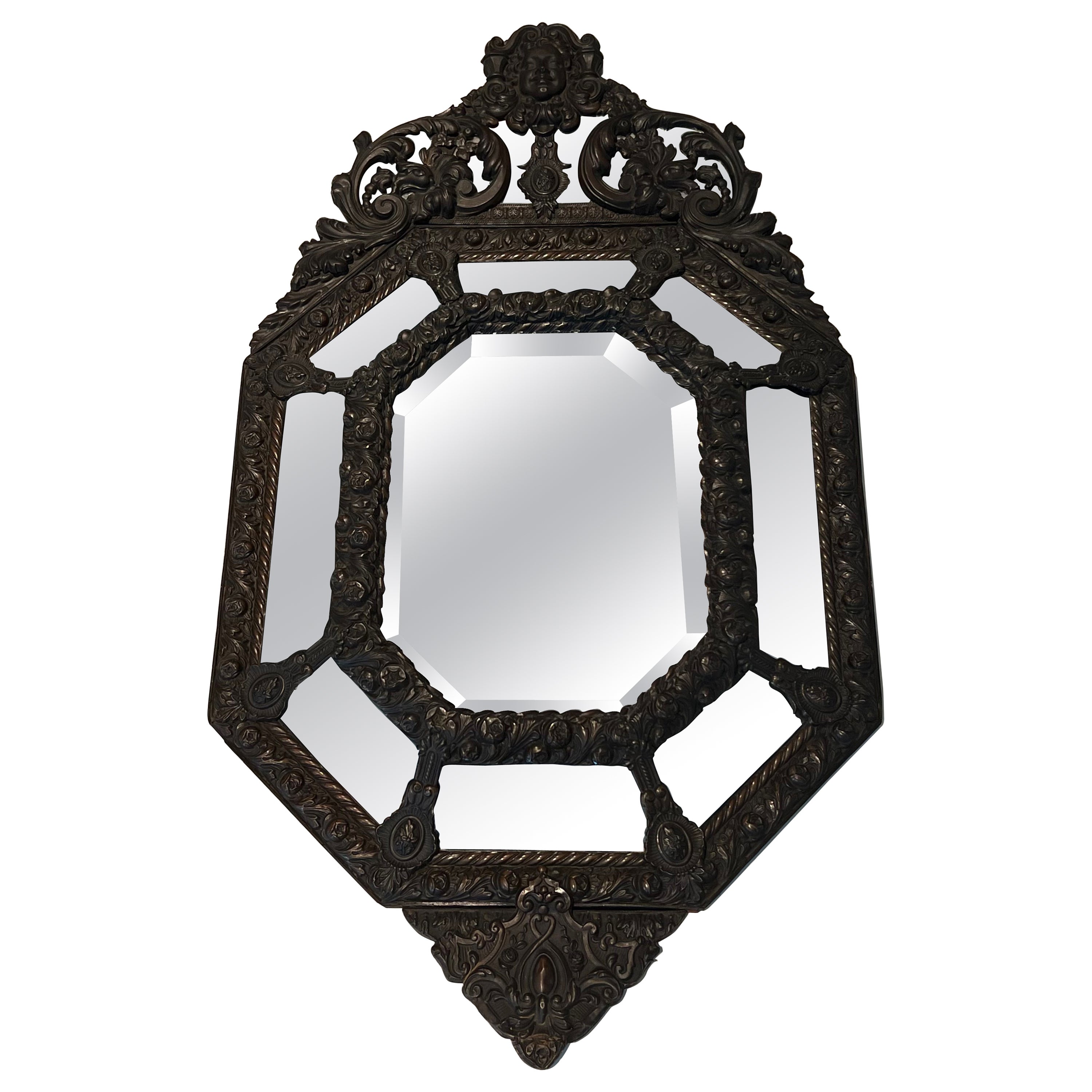 Mirror with Closed Pares in Repoussé Copper Decorated with Garlands of Flowers