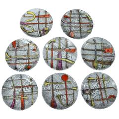 Piero Fornasetti Orchestra Coasters in a complete Set of eight.,