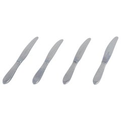 Gundorph Albertus for Georg Jensen. Four Mitra dinner knives in stainless steel