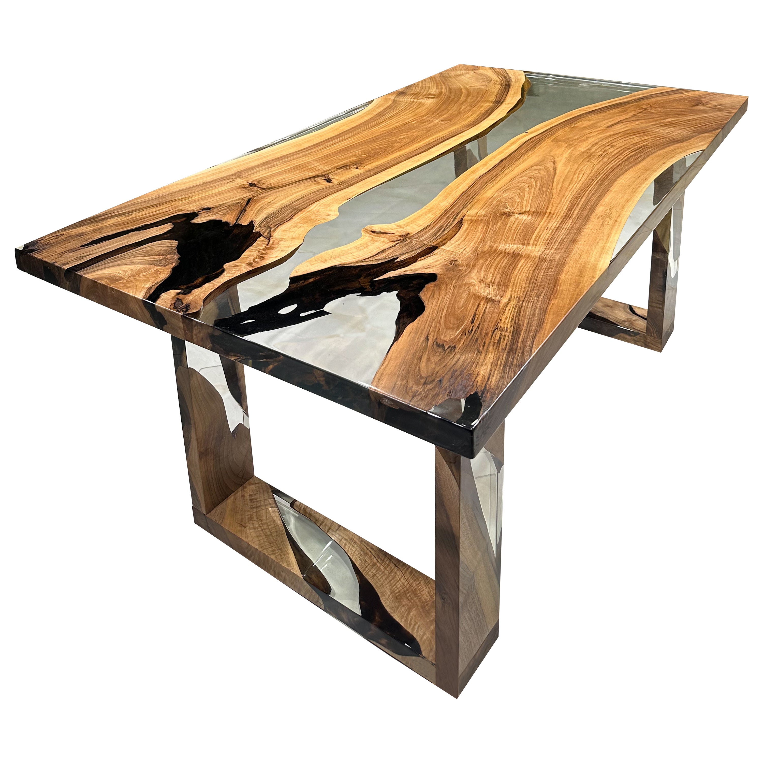 Custom Epoxy Resin Dining Table 

This table is made of 500 years old Walnut Wood. The grains and texture of the wood describe what a natural walnut woods looks like.
It can be used as a dining table or as a conference table. Suitable for indoor