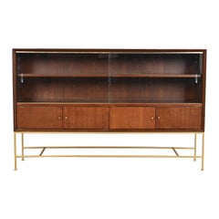 Libreria o mobile bar in mogano e ottone della collezione Paul McCobb Irwin