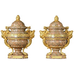 Pair of Late 19th-Early 20th Century French Bronze-Mounted Pink Granite Urns