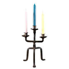 Brutalist tripod candlestick in wrought iron, France, 1950s