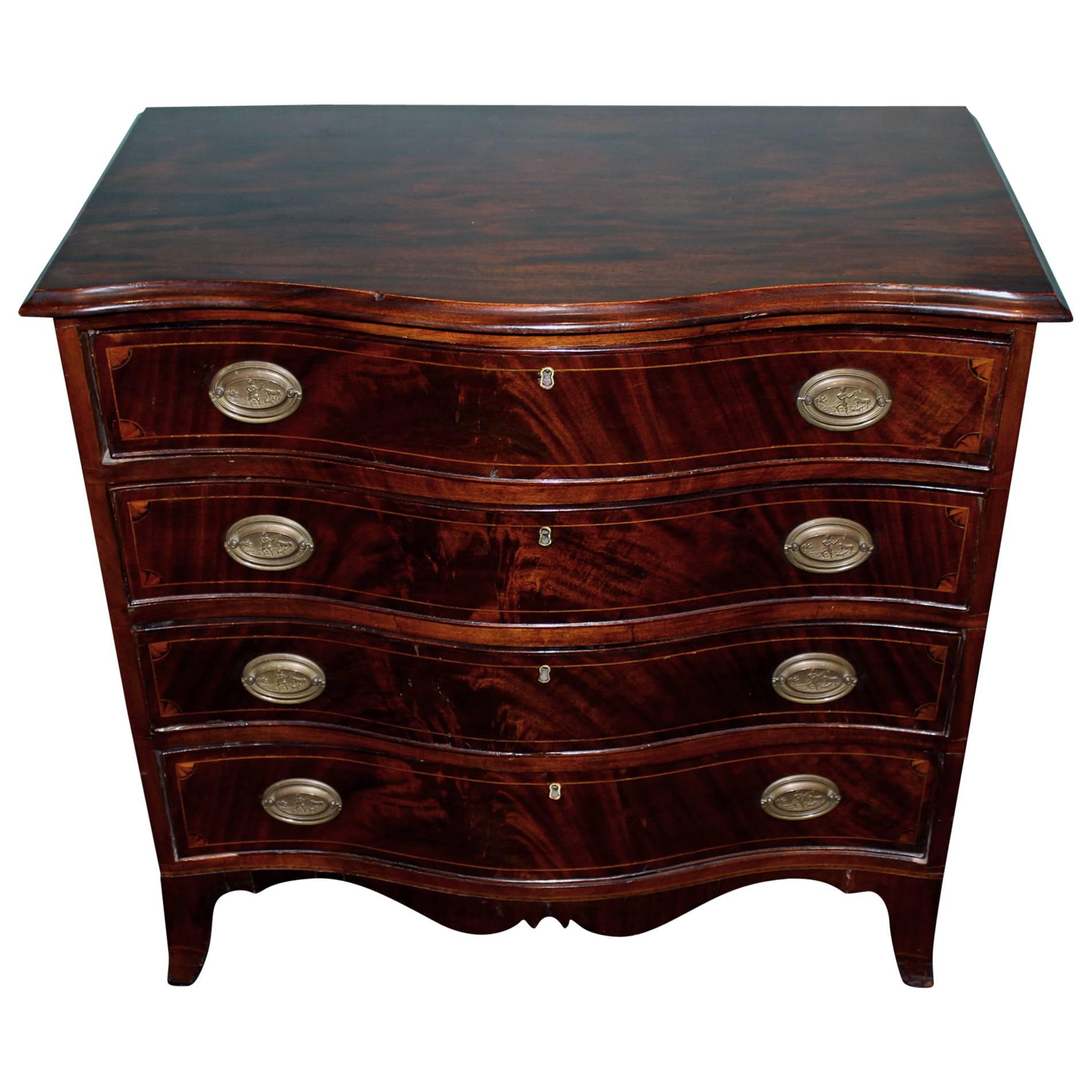 19th Century Diminutive Serpentine Mahogany Four-Drawer Chest