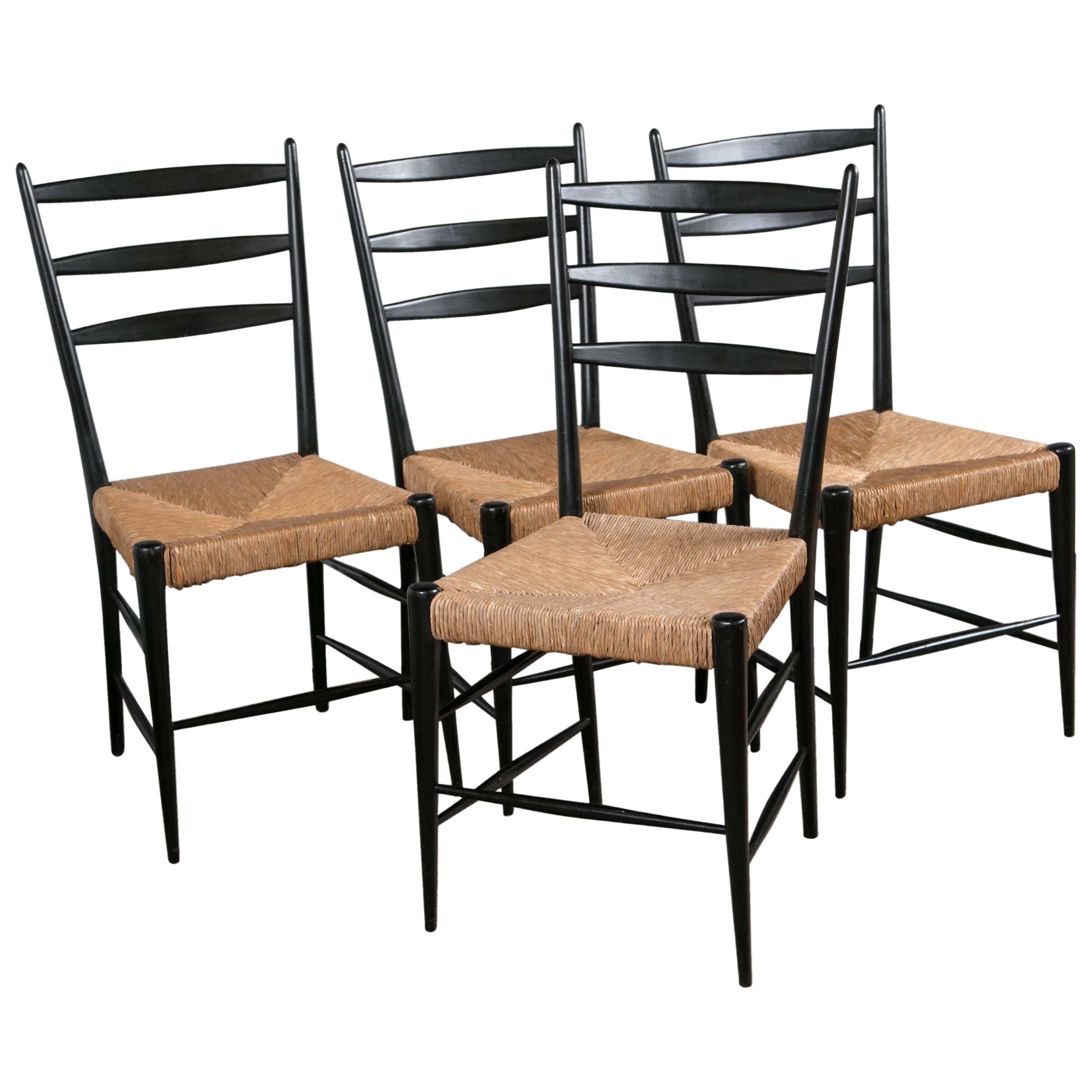 Set of Four Black Lacquer & Rattan Chairs For Sale