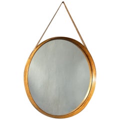 Round wall mirror with light teak frame, leather hook for posting 1960 Italian