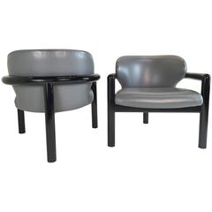 Pair of Pewter Leather Three Legged Chairs