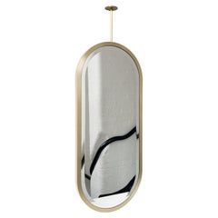 Miroir moderne suspendu au plafond en forme de pilier biseauté avec cadre en laiton