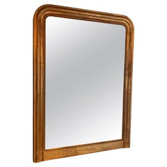Espejo Louis Philippe de madera dorada con diseño de llave griega